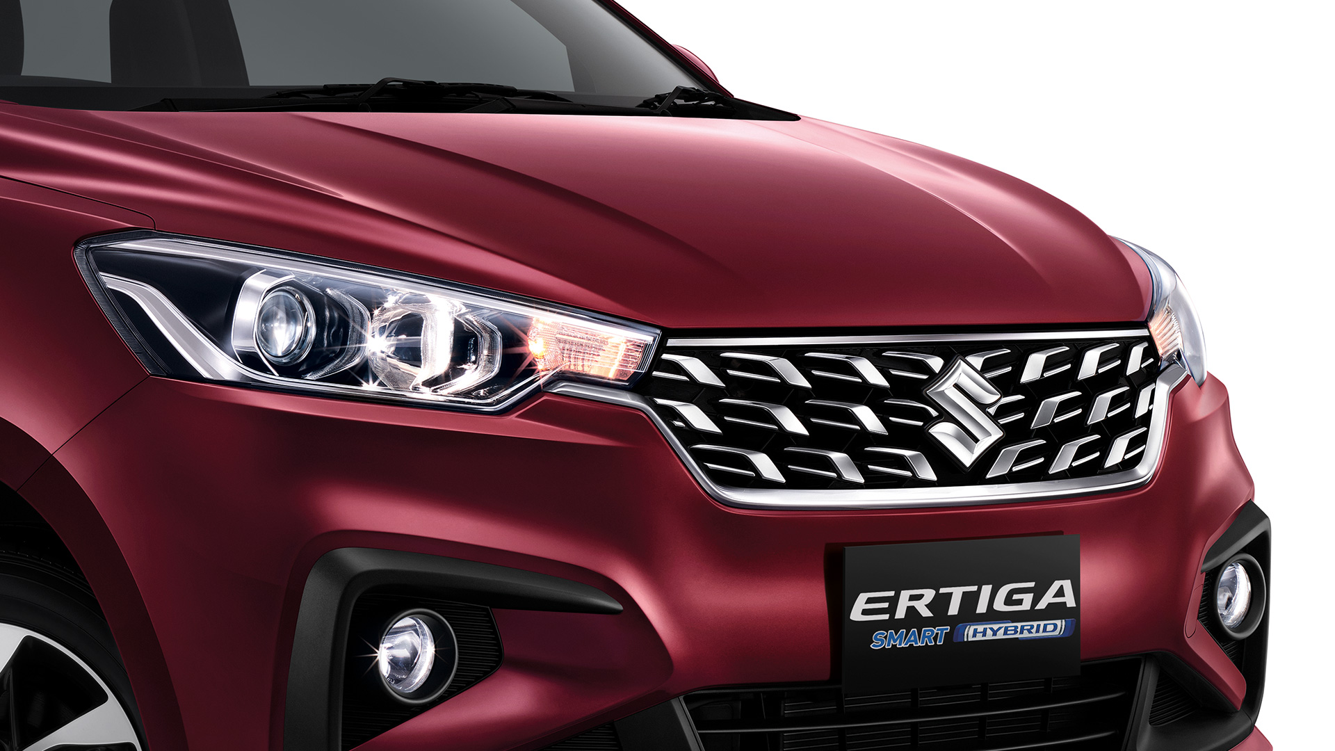 Suzuki ERTIGA Projector headlamps with luxury chrome front grille.