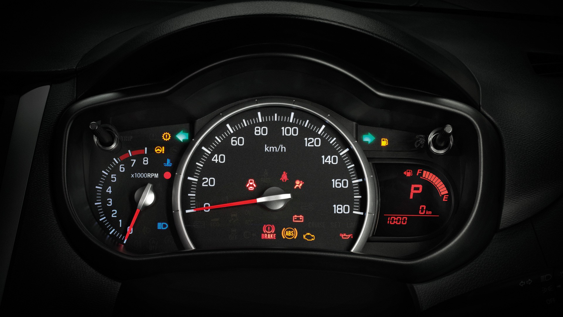 Meters including the tachometer, fuel gauge, fuel consumption display gauge and odometer with a digital clock.