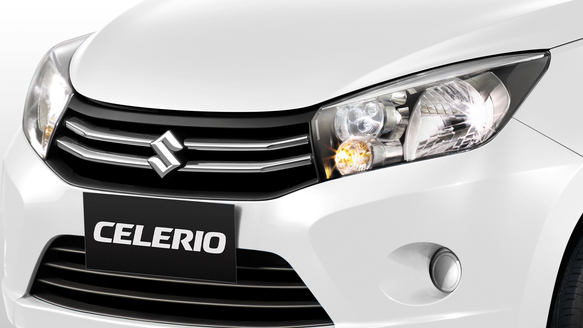 Suzuki CELERIO A Chrome Front Grille That Blends Together with The Front Multi-Reflector.